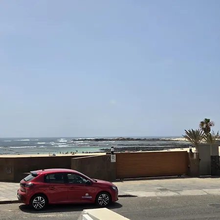 Апартаменты Lagos Loft Frente A La Playa Y Patio Privado El Cotillo (Fuerteventura)